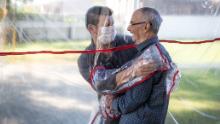 Brazilian care home creates &#39;hug tunnel&#39; so loved ones can embrace elderly relatives