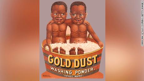 A Gold Dust Washing Powder trade card features the companies Gold Dust Twins mascots.