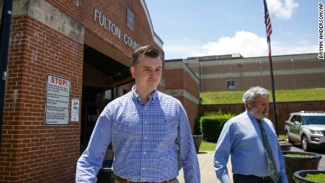 Former officer Devin Brosnan walks out of the Fulton County Jail on bail after his release Thursday. 