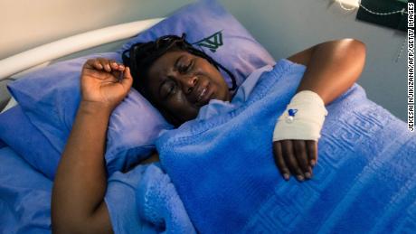 Joana Mamombe lies on a hospital bed at a private hospital in Harare on May 15. 