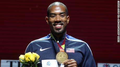 Gold medallist Taylor poses on the podium during the medal ceremony for the Men&#39;s Triple Jump at the 2019 IAAF World Athletics Championships.