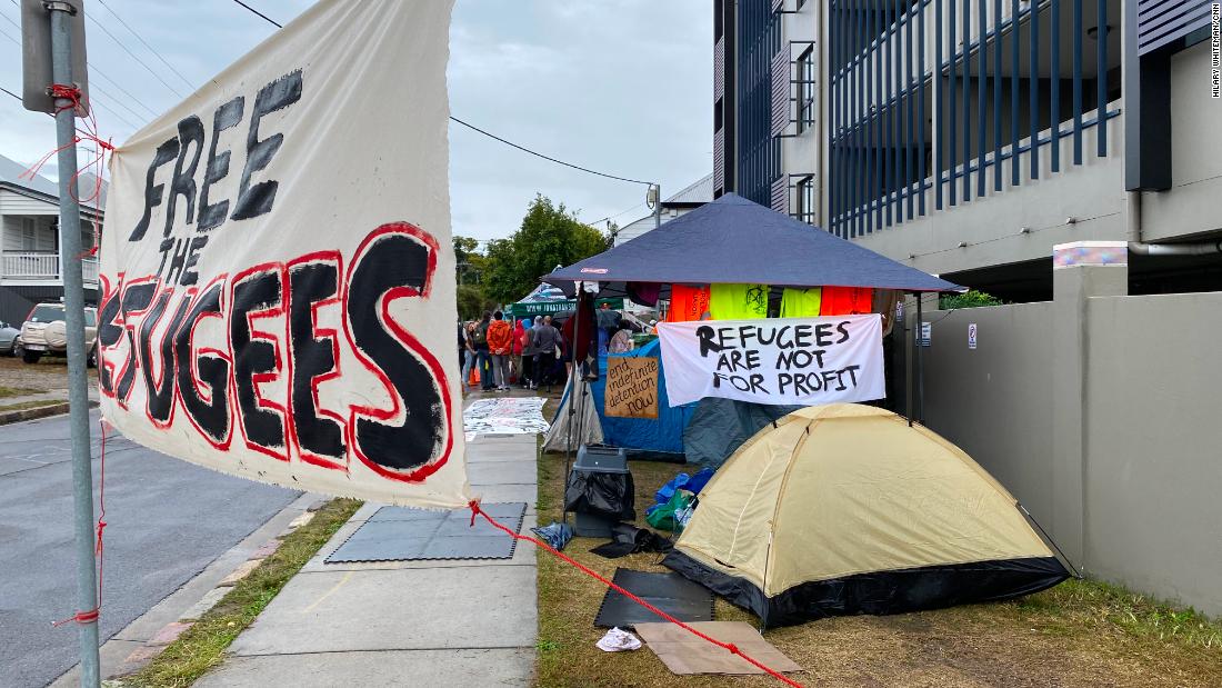 Protesters camped in tents outside the hotel until police cleared the sidewalk. Then they moved across the street.