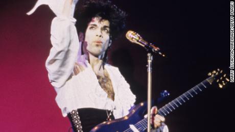 Prince performs in concert with his &quot;Blue Angel&quot; guitar in 1989.