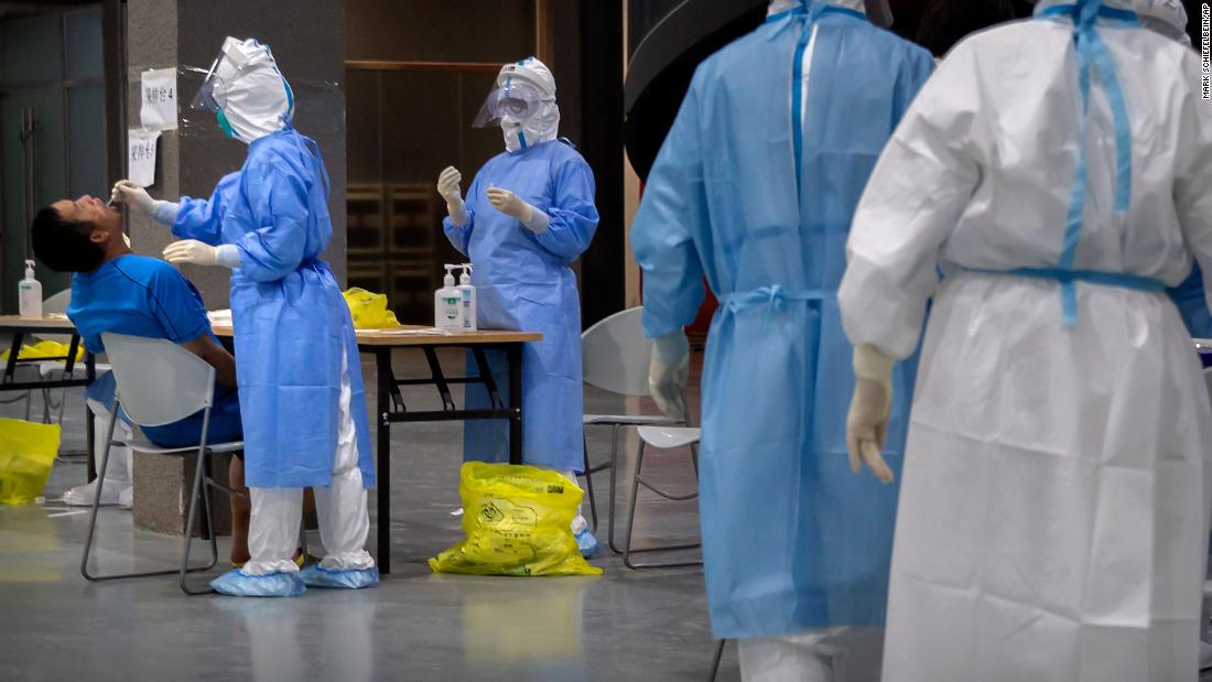 A man has his throat swabbed June 17 at a Covid-19 testing site for those who were potentially exposed to the coronavirus at a wholesale food market in Beijing. For 55 days, the Chinese capital had not reported any locally transmitted infections, but &lt;a href=&quot;http://www.cnn.com/2020/06/18/asia/beijing-coronavirus-reminder-intl-hnk/index.html&quot; target=&quot;_blank&quot;&gt;a fresh cluster of coronavirus cases emerged&lt;/a&gt; from a sprawling wholesale food market in the city, infecting more than 180 people as of June 19.