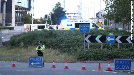 Officers near Forbury Gardens in Reading, England, where police responded to a stabbing incident on Saturday, June 20, 2020.