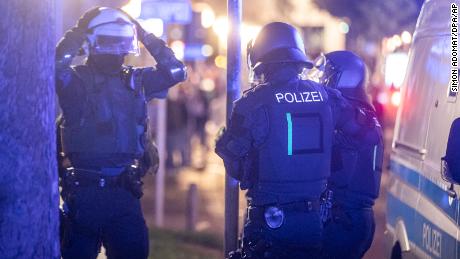 Police officers responding to riots in Stuttgart, Germany.