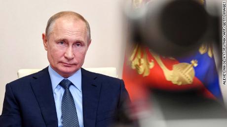 Vladimir Putin strongly hints he will run again for president