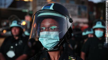 A female officer is seen while protests continued over the death of George Floyd in Brooklyn on June 6, 2020. 