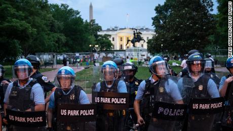 U.S. Park Police keep protesters back after they attempted to pull down the statue of Andrew Jackson in Lafayette Square near the White House on June 22, 2020 in Washington, DC. Protests continue around the country over police brutality, racial injustice and the deaths of African Americans while in police custody. 