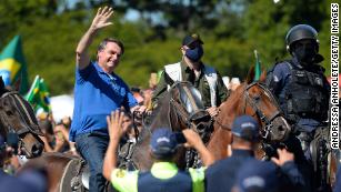 Brazil judge orders President Jair Bolsonaro to wear a face mask in public