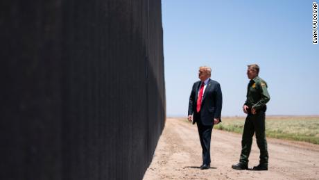 United State Border Patrol chief Rodney Scott gives President Donald Trump a tour of a section of the border wall, Tuesday, June 23, 2020, in San Luis, Ariz. (AP Photo/Evan Vucci)