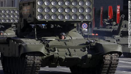 A TOS-1A Buratino multiple rocket launcher moves along Tverskaya Street ahead of the military parade in Red Square.