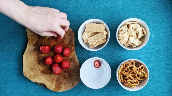 Graham crackers, animal crackers, strawberries and pretzel twists make great dippers for Funfetti dip.