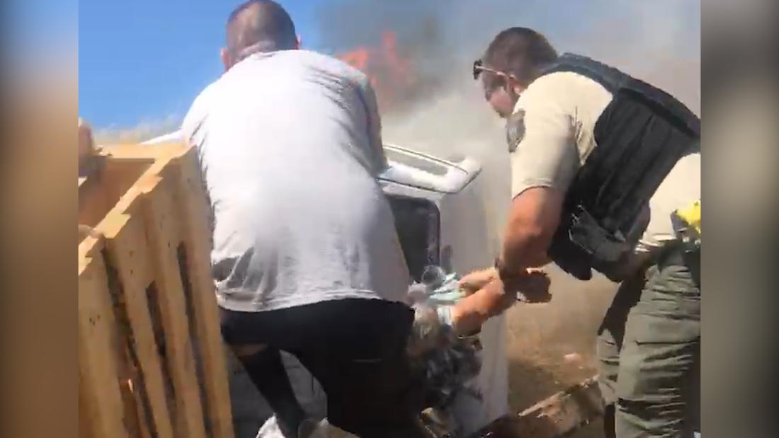 Watch Dramatic Rescue Of Man Stuck In Burning Truck Cnn Video 