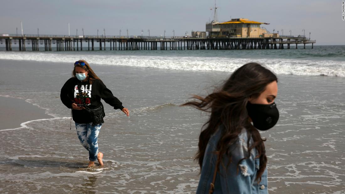 Malia Pena and her mother, Lisa Torriente, wear masks as they visit the beach in Santa Monica, California, on June 23. California was among 25 states &lt;a href=&quot;http://www.cnn.com/2020/06/23/us/us-coronavirus-tuesday/index.html&quot; target=&quot;_blank&quot;&gt;that had recorded higher rates of new cases&lt;/a&gt; compared to the previous week.