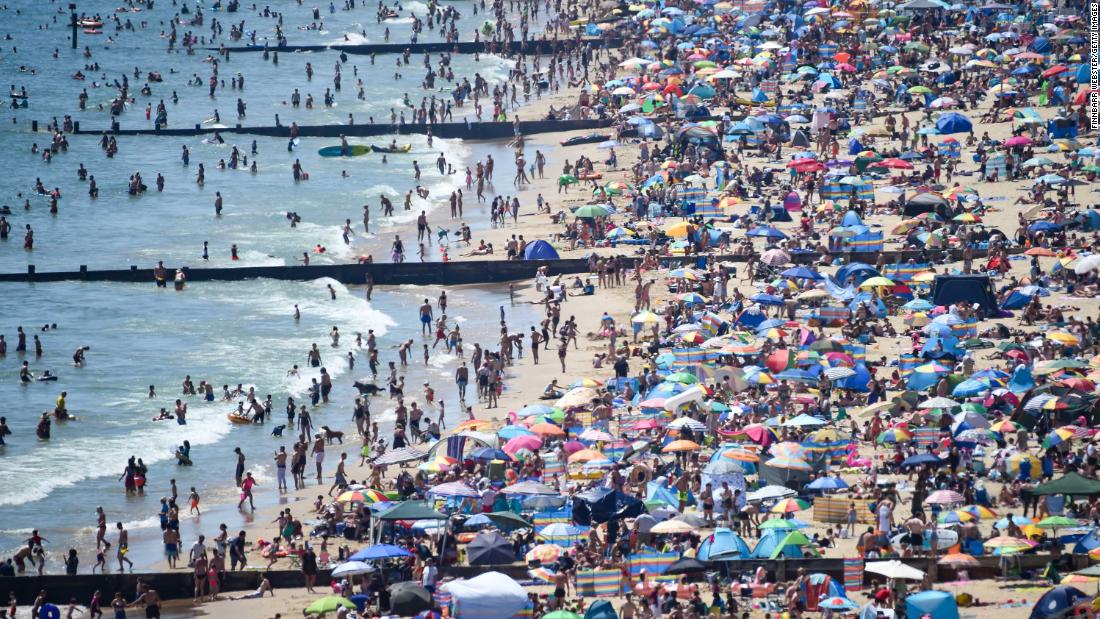 A beach is slammed with people in Bournemouth, England, during a heat wave on June 25. British Prime Minister Boris Johnson &lt;a href=&quot;http://www.cnn.com/2020/05/10/uk/uk-coronavirus-lockdown-boris-johnson-gbr-intl/index.html&quot; target=&quot;_blank&quot;&gt;began easing coronavirus restrictions in May,&lt;/a&gt; but people are still supposed to be distancing themselves from one another. After thousands flocked to beaches, officials in southern England &lt;a href=&quot;http://edition.cnn.com/travel/article/bournemouth-major-incident-beaches-scli-intl-gbr/index.html&quot; target=&quot;_blank&quot;&gt;declared a &quot;major incident.&quot;&lt;/a&gt;