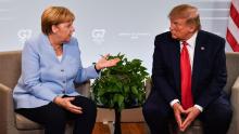 Trump showed shocking disdain for his peers: German Chancellor Angela Merkel speaks with the President during a bilateral meeting in Biarritz, south-west France on August 26, 2019, at the G7 Summit. 