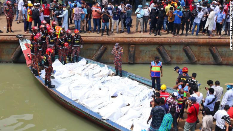 At least 32 people died after a ferry capsized and sank in the Bangladeshi capital Dhaka following a collision with another vessel, officials said.