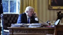 Trump speaks on the phone with Russia's President Vladimir Putin from the Oval Office of the White House in January 2017.