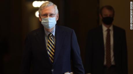 Senate Majority Leader Sen. Mitch McConnell (R-KY) wears a mask as he walks through a hallway at the U.S. Capitol May 11, 2020 in Washington, DC.