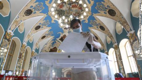 A man casts a ballot at a polling station in Moscow on Tuesday.