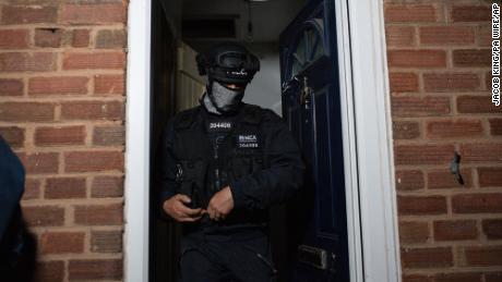 The National Crime Agency and police during raid on a property in Birmingham, UK.