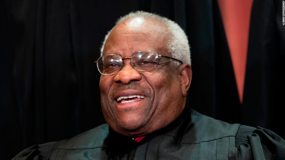 Justice Clarence Thomas takes part in a Supreme Court photo shoot in November 2018.