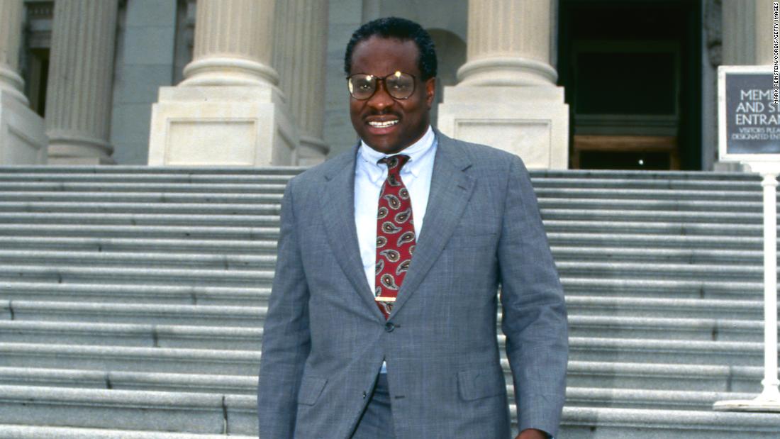Thomas walks down the steps of the US Capitol after meeting with members of Congress in July 1991.