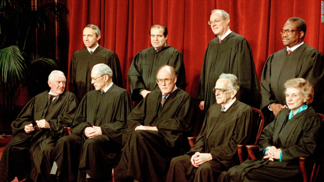 Members of the Supreme Court pose for a formal portrait in December 1991. In the back row, from left, are David Souter, Antonin Scalia, Anthony Kennedy and Thomas. Seated from left are John Paul Stevens, Byron White, Chief Justice William Rehnquist, Harry Blackmun and Sandra Day O&#39;Connor.