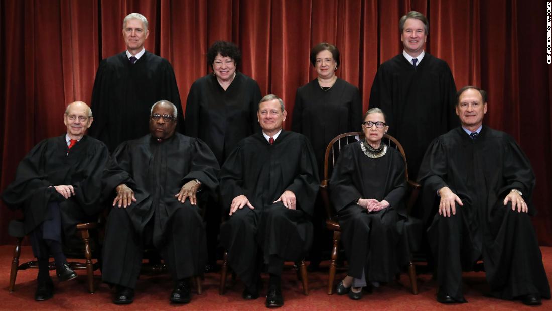 The Supreme Court poses for a portrait in November 2018. In the back row, from left, are Neil Gorsuch, Sonia Sotomayor, Elena Kagan and Brett Kavanaugh. In the front, from left, are Stephen Breyer, Thomas, Chief Justice John Roberts, Ruth Bader Ginsburg and Samuel Alito.