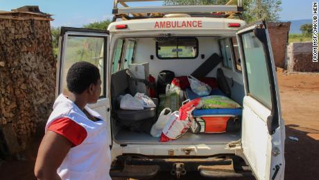 MSF mobile clinic visits patient homes delivering drug refills and food support
