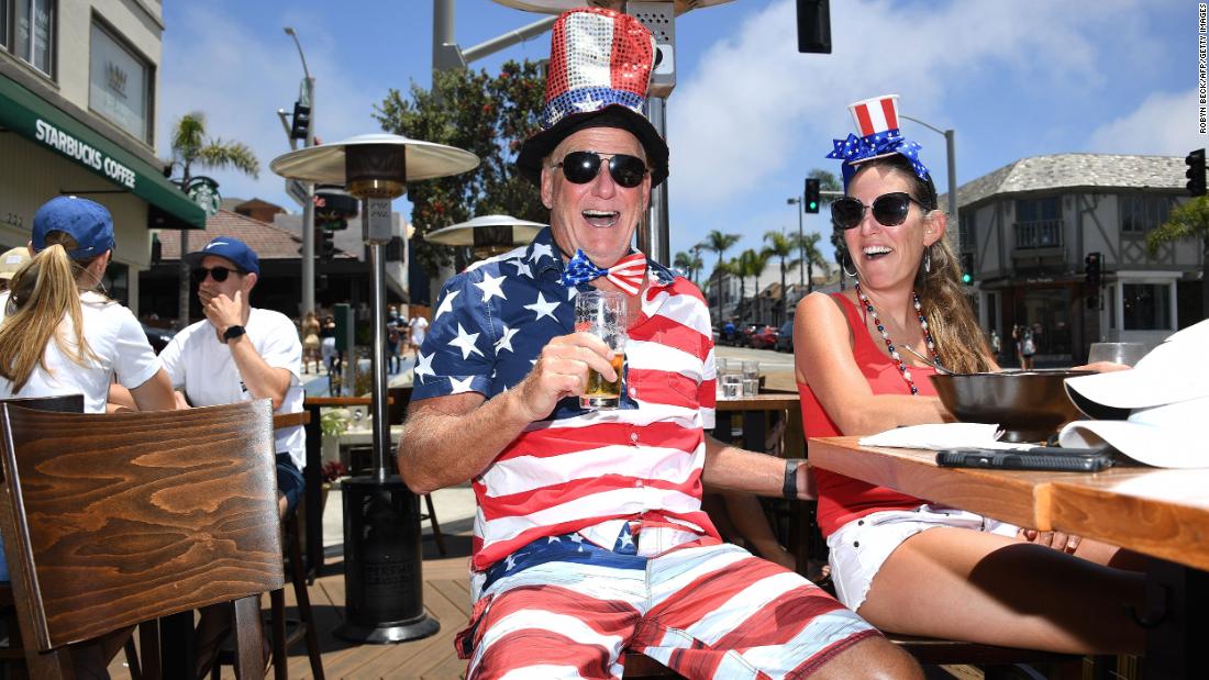 Dave Barnes and his wife Christy Barnes enjoy lunch at a restaurant in Manhattan Beach, California.