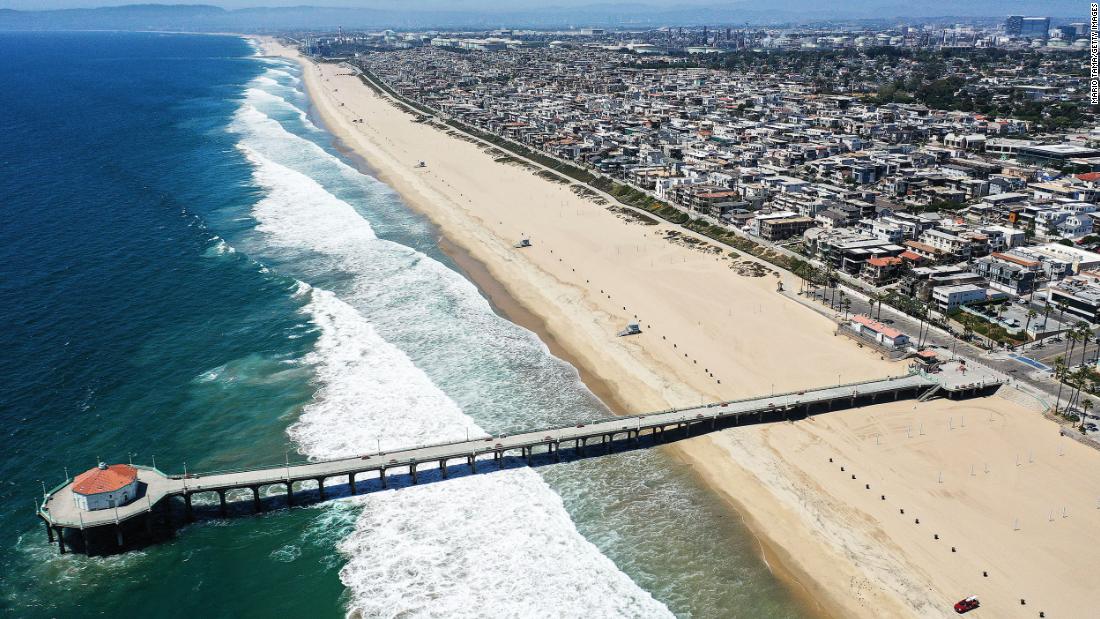 An aerial view of an empty beach in Manhattan Beach, California. Los Angeles County beaches were closed for the holiday in an effort to curb the spread of coronavirus.