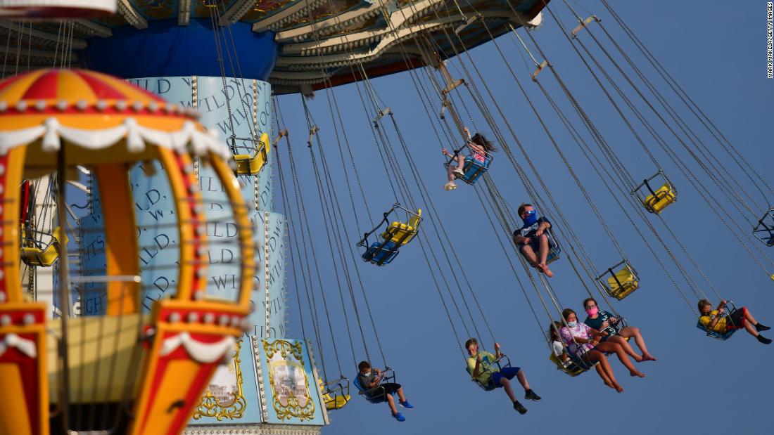 People enjoy an amusement park ride on a pier in Wildwood, New Jersey.