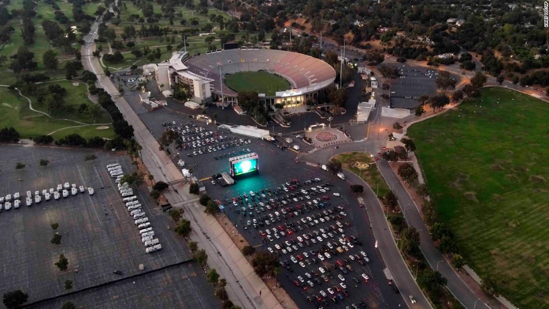 People watch a movie at the Tribeca Drive-In at the Rose Bowl Stadium in Pasadena, California.