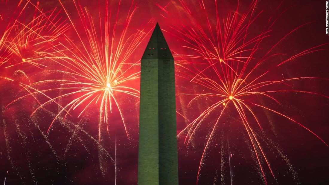 Fireworks go off behind the Washington Monument in Washington, DC, on Saturday, July 4.