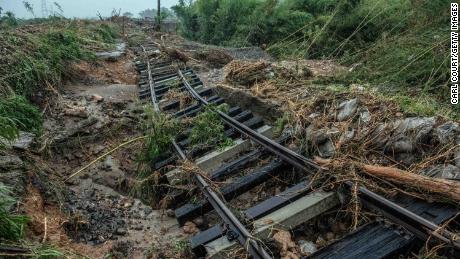 A rail line lies upturned after being submerged by floodwater when the nearby Kuma River burst its banks, on July 5 in Hitoyoshi, Japan.