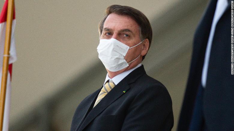 Bolsonaro tests positive for Covid-19 after downplaying virus