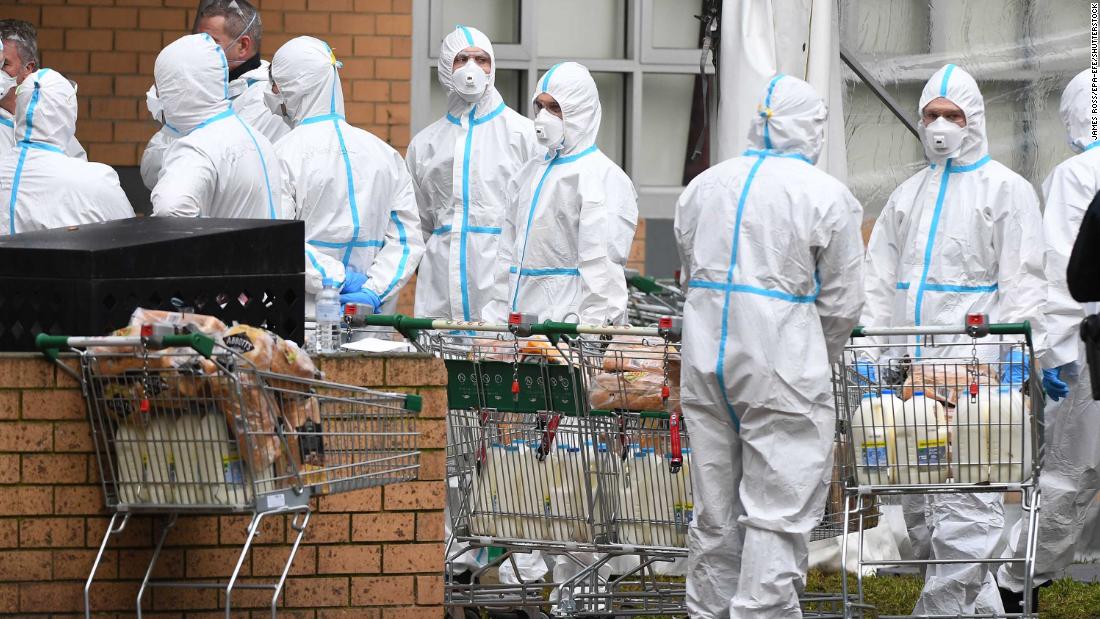 Firefighters dressed in personal protective equipment prepare to distribute food at a public housing tower in North Melbourne, Australia, on July 7. Metropolitan Melbourne was placed under lockdown amid a &lt;a href=&quot;https://www.cnn.com/2020/07/07/asia/melbourne-coronavirus-lockdown-intl-hnk/index.html&quot; target=&quot;_blank&quot;&gt;resurgence of coronavirus cases.&lt;/a&gt;