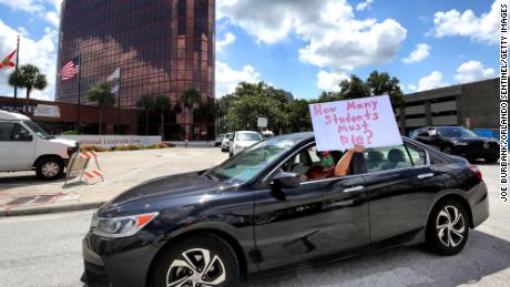 Teachers were protesting outside Florida&#39;s Orange County Public Schools headquarters on Tuesday.