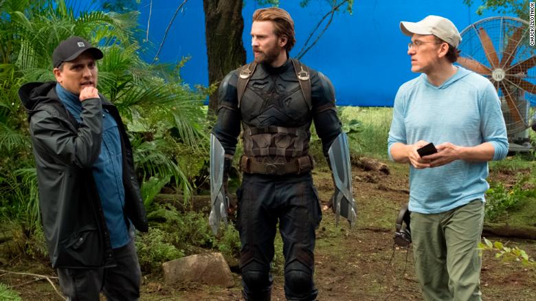 Directors Joe Russo, left, and Anthony Russo, right, flank Chris Evans on the set of &#39;Avengers: Infinity War.&#39; (Chuck Zlotnick/Marvel Studios)