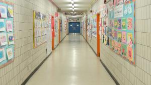 A hallway is empty on what would otherwise be a school day as teachers and faculty members learn remote teaching and methods for students at Yung Wing School P.S. 124 in the Manhattan borough of New York City. Public schools in New York City have been shut down until at least until April 20th amid the spread of coronavirus (COVID-19). 