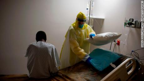 A healthcare worker tends to a patient in the Covid-19 unit at United Memorial Medical Center in Houston, Texas on July 2. (Mark Felix/AFP via Getty Images)