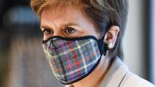 First Minister of Scotland Nicola Sturgeon wears a Tartan face mask as she visits a retail park last month in Edinburgh. 