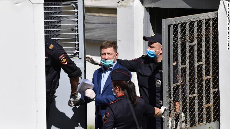 Khabarovsk Governor Sergey Furgal is escorted into a police van after a court hearing in Moscow on Friday.