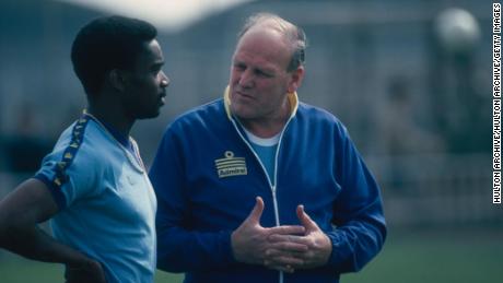 England manager Ron Greenwood speaks to Laurie Cunningham during training.