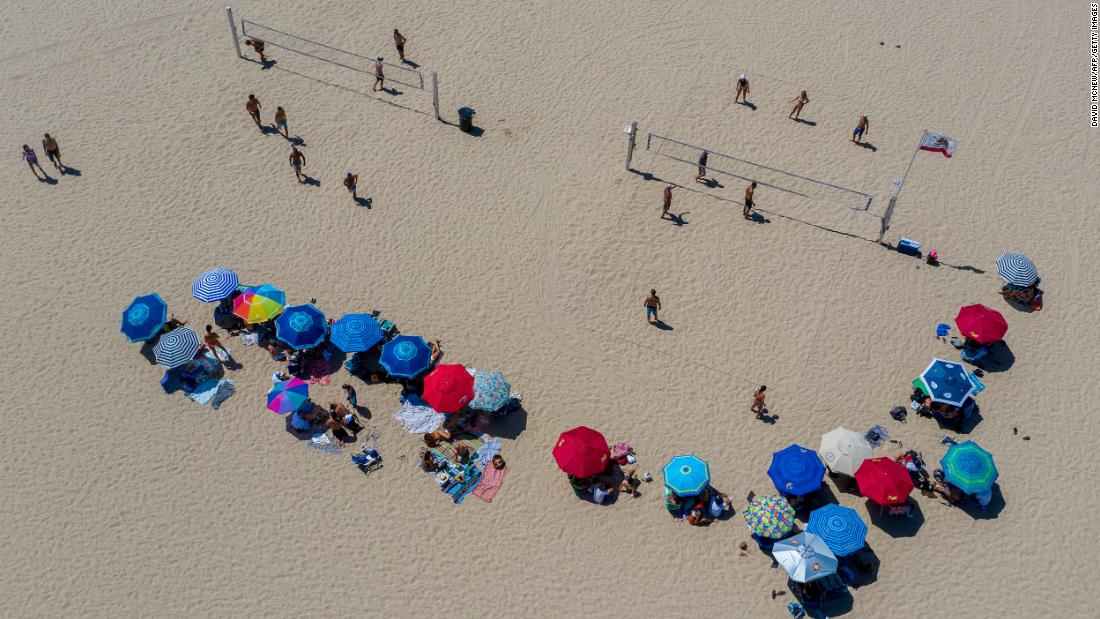 People play volleyball in Hermosa Beach, California, on July 12. Los Angeles County beaches were reopened after being closed over the Fourth of July weekend. California is one of almost three dozen states in which &lt;a href=&quot;http://www.cnn.com/2020/07/13/us/us-coronavirus-monday/index.html&quot; target=&quot;_blank&quot;&gt;cases were rising.&lt;/a&gt;