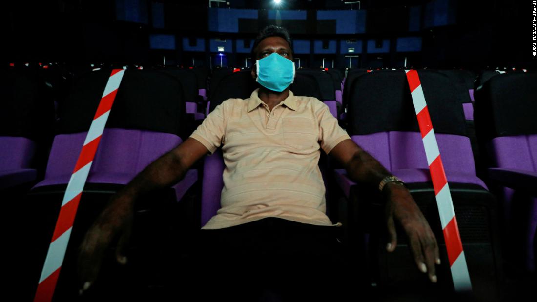A man watches a movie at a cinema in Colombo, Sri Lanka, on July 11.