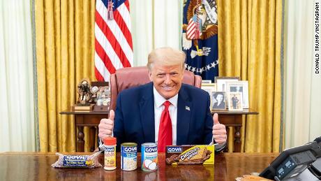 President Trump poses with Goya products.