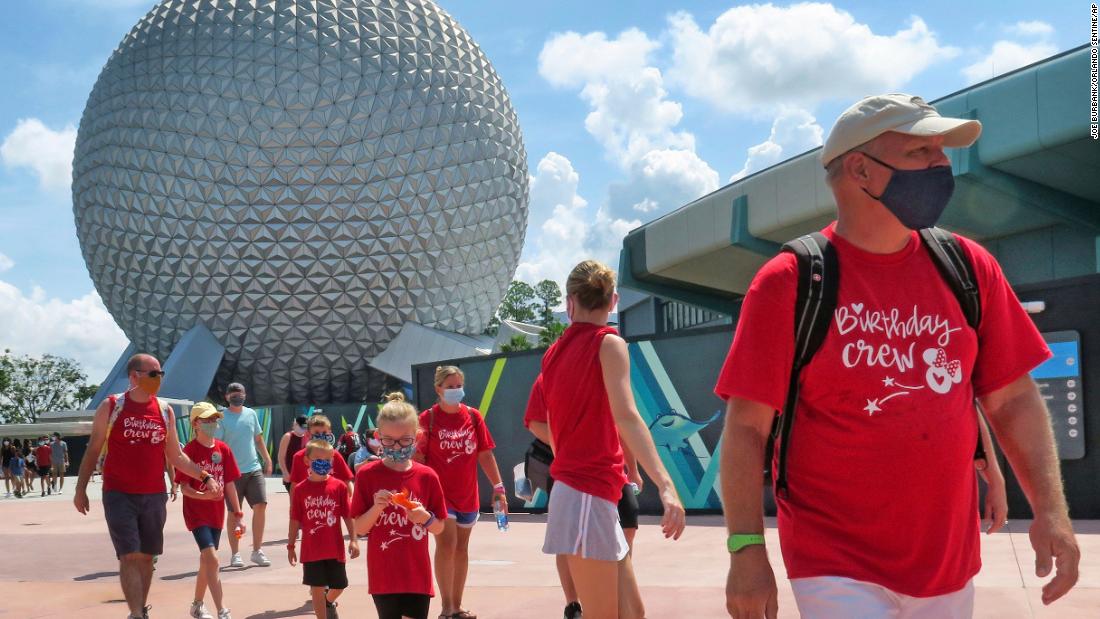 Guests arrive at Disney&#39;s Epcot park in Lake Buena Vista, Florida, on July 15. &lt;a href=&quot;http://www.cnn.com/travel/article/disney-world-epcot-reopens/index.html&quot; target=&quot;_blank&quot;&gt;The park was reopening,&lt;/a&gt; as was Hollywood Studios, for the first time since March 15.